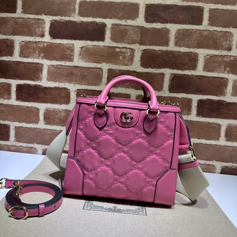 G*u*i top handle bags